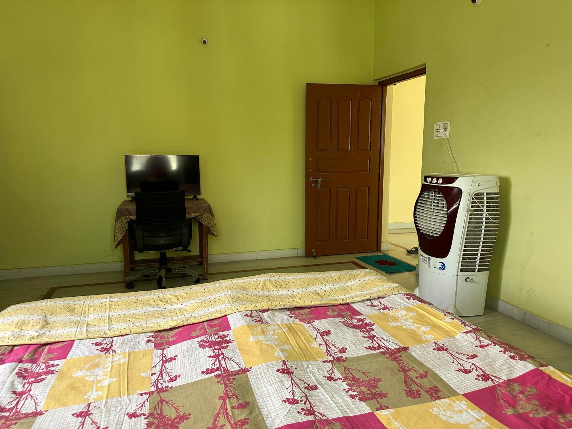 Amma's Om Apartment